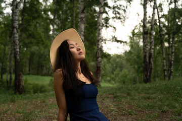 Asian girl enjoys the fresh forest air