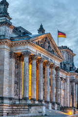 The main portal of the Reichstag in Berlin at dawn