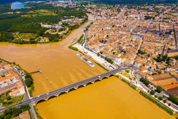 Panoramic aerial view of Libourne city on Dordogne river on sunny summer day, Gironde, France