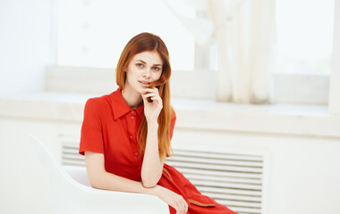 Beautiful woman in red dress fashion style model