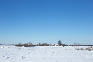 Winter landscape, blue skies and sparkling snow