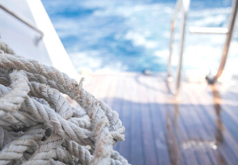 old shabby rope at the stern of the yacht