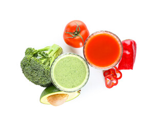 Glasses of healthy smoothie with vegetables on white background