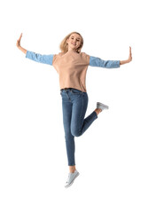 Obraz premium Jumping young woman on white background