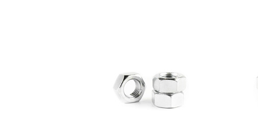 Steel nuts screws on a white background. Thread