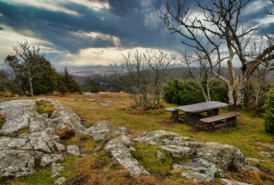 View from the top of Omberg hill &Ouml;sterg&ouml;tland, Sweden. Rocks and a wooden table for rest