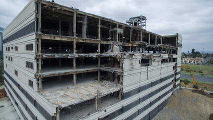 A building gets torn down bit by bit