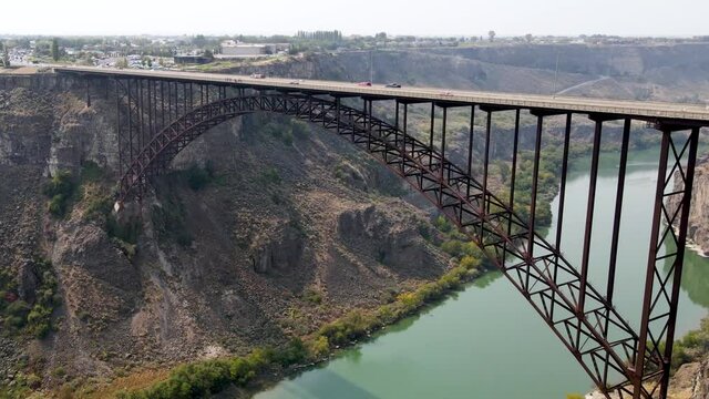Aerial view of the Perrine Memorial Bridge over the snake river in Twin Falls, Idaho. With cars driving across the bridge.