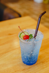 Blue Cocktail Drink with cherries and lemon