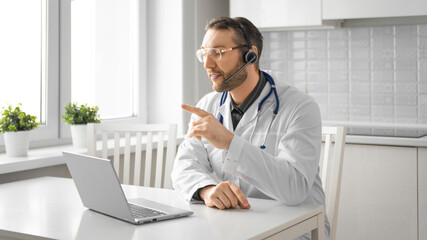 Doctor during an online video call. Format 16:9.