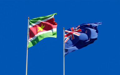 Flags of Suriname and New Zealand.