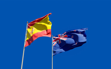 Flags of Spain and New Zealand.