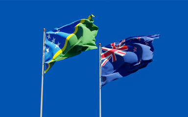 Flags of Solomon Islands and New Zealand.