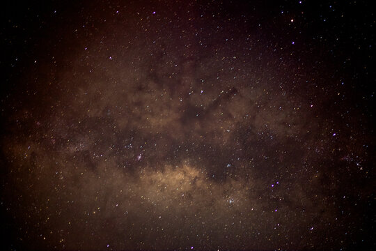 Abstract background of celestial stars, blurred wallpaper of the Milky Way at night, is a natural beauty. Seen during the time of the season © bangprik