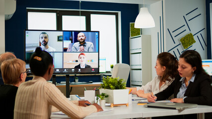 Emplyees workers having webcam group conference with coworkers speaking on video chat call with diverse colleagues online briefing. Diverse people talking at virtual meeting, online discussion. - obrazy, fototapety, plakaty