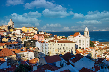 Fototapeta na wymiar Sao Vicente de Fora Monastery and dome of the National Pantheon seen from Portas do Sol in Lisbon, Portugal.