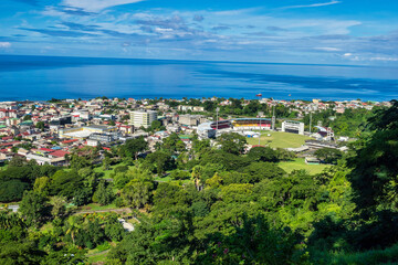 Fototapeta na wymiar Scenic view of Roseau town and sea, Dominica island. Seen from the small mountain Morne Bruce