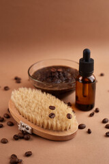 Homemade cosmetics with coffee scrub and oil. Set of home SPA cosmetic products. Dry Brush, Coffee Scrub, Organic Oil. Anti-cellulite homemade cosmetic for peeling and spa care