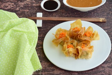 Siomay, Indonesian Food, steamed dumplings with peanut sauce and thick soy sauce or kecap manis