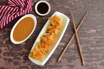 Siomay, Indonesian Food, steamed dumplings with peanut sauce and thick soy sauce or kecap manis