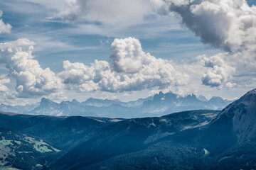 Fototapeta na wymiar panoramic view of the Dolomites with beautiful weather clouds , Italy.