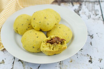 Turmeric black sesame bread buns with chicken filling
