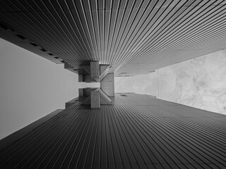Bottom-up view of the two walls of a modernist building connected by a passage from above. Linear perspective.