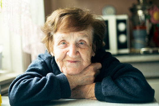 Portrait of an Old lady in her home.