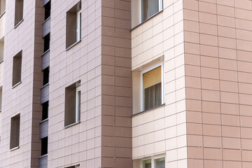 Fragment residential apartment with flat building exterior. Detail of New luxury house and home complex.