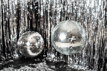 Festive background. disco ball on beige and silver background. Christmas. Wedding. Birthday