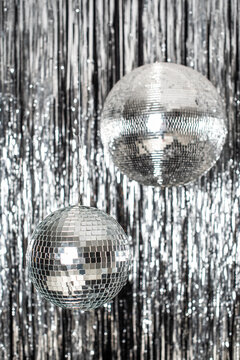 Festive background. disco ball on beige and silver background. Christmas. Wedding. Birthday