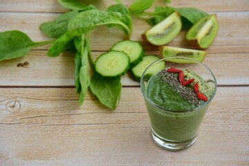 Spirulina green smoothie with goji berry, spinach, chia seed and hemp seed