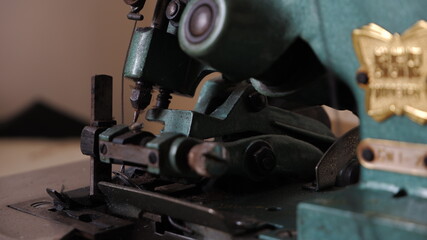 A machine that helps complete the work of the tailor