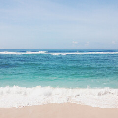 Stunning view, crystal clear blue water & white sand beach at Gunung Payung Beach Bali Indonesia