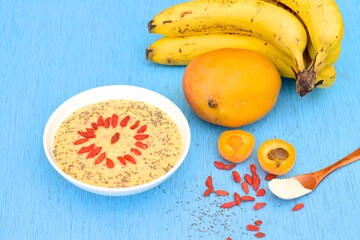 Mango apricot smoothie with chia seed, goji berry and baobab powder