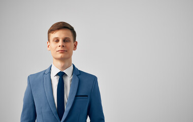 Man blue jacket tie manager official Professional gray background