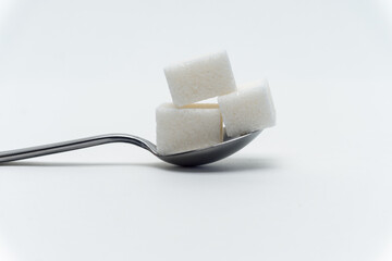 sugar cubes in a teaspoon sweets calorie ingredient Glucose