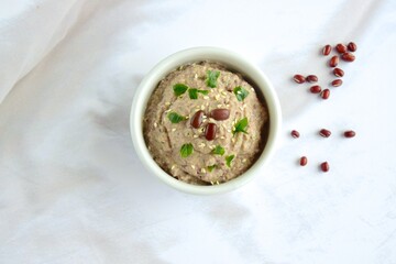 Adzuki bean tahini dip on white background