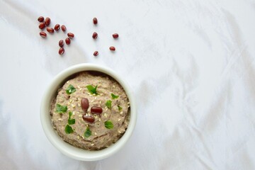 Adzuki bean tahini dip on white background