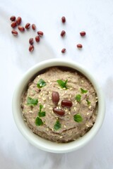 Adzuki bean tahini dip on white background