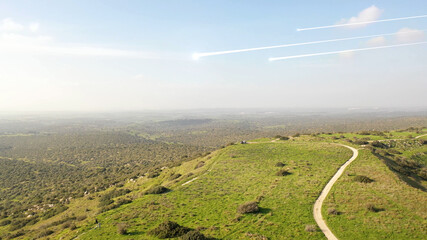 Meteor asteroid crossing the sky over the mountain,aerial view
, drone view over green hill with...