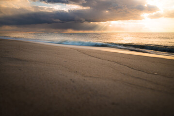 Fototapeta na wymiar Dramatic sunset at a beach on Sylt island Germany 