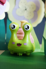 cute toy for children, snail in flowers