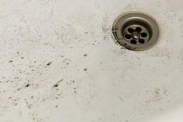 .Dirty sink close-up. The concept of cleanliness and hygiene