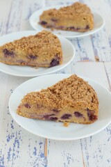 Slice of blueberry crumble cheesecake. Dessert for coffee time