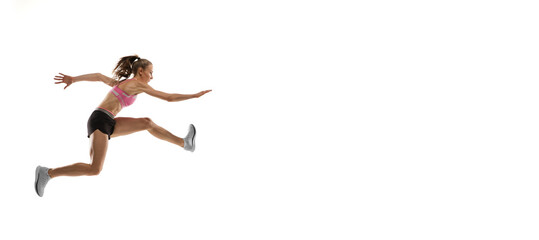 Flyer. Caucasian professional female athlete, runner training isolated on white studio background....