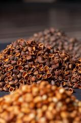 A slide of peeled pine nut shells.