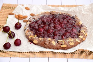 Homemade cherry pie almond chocolate galette. Cherry galette. Summer Dessert