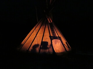 a tipi from the outside at nighttime in the Kluane National Park and Reserve of Canada, Yukon, September © Miriam