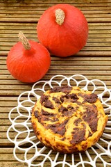 Homemade pumpkin chocolate swirl cheesecake